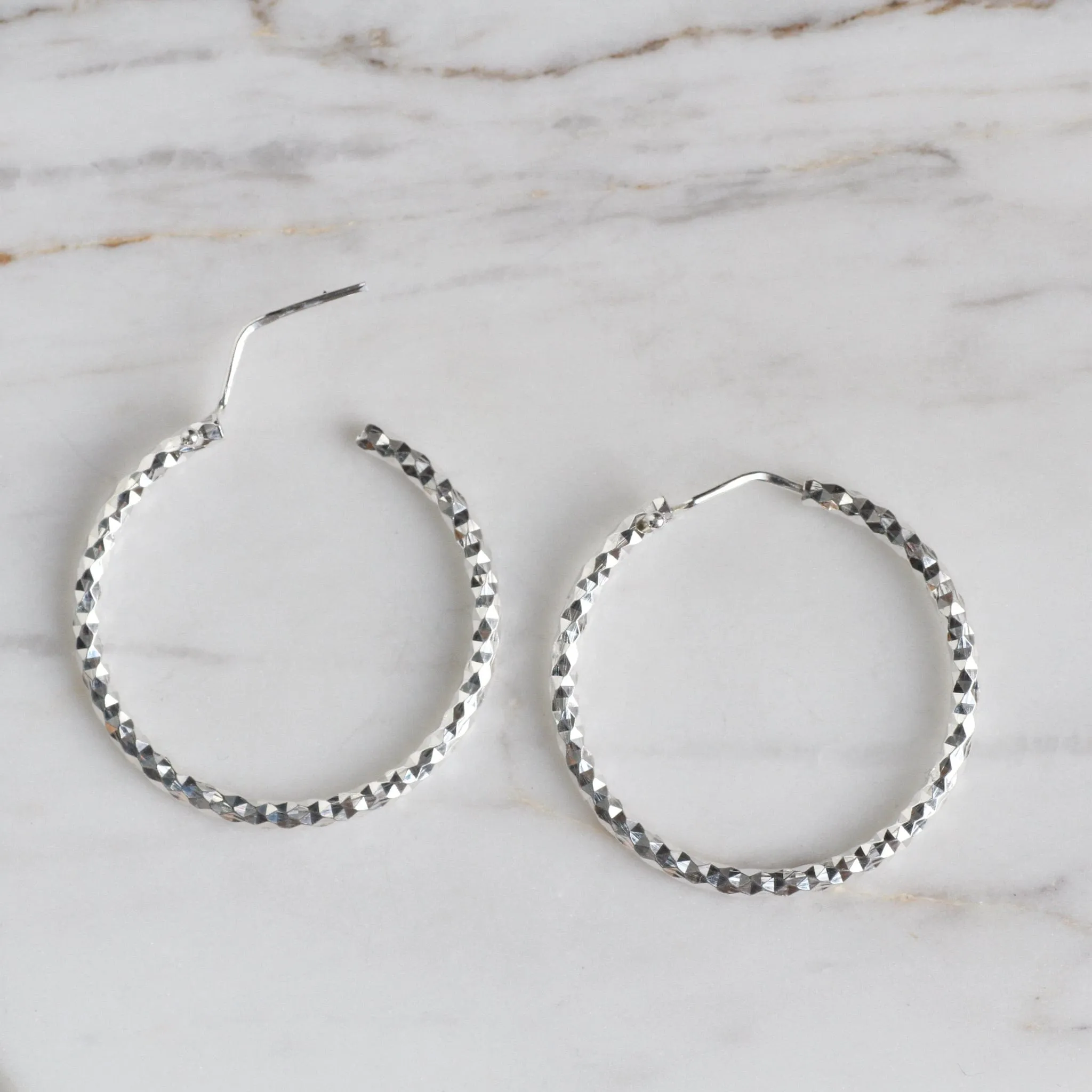 Small Sterling Silver Faceted Hoops